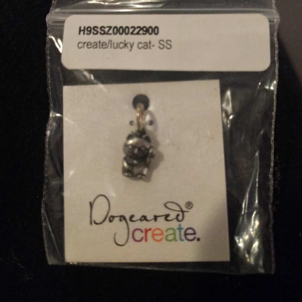 Lucky cat charm from dogeared